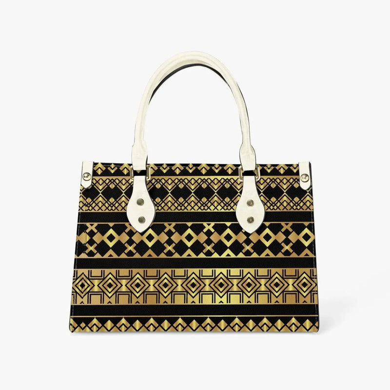 Ivory tote bag with gold geometric patterns and long ivory handles, modern fashion accessory