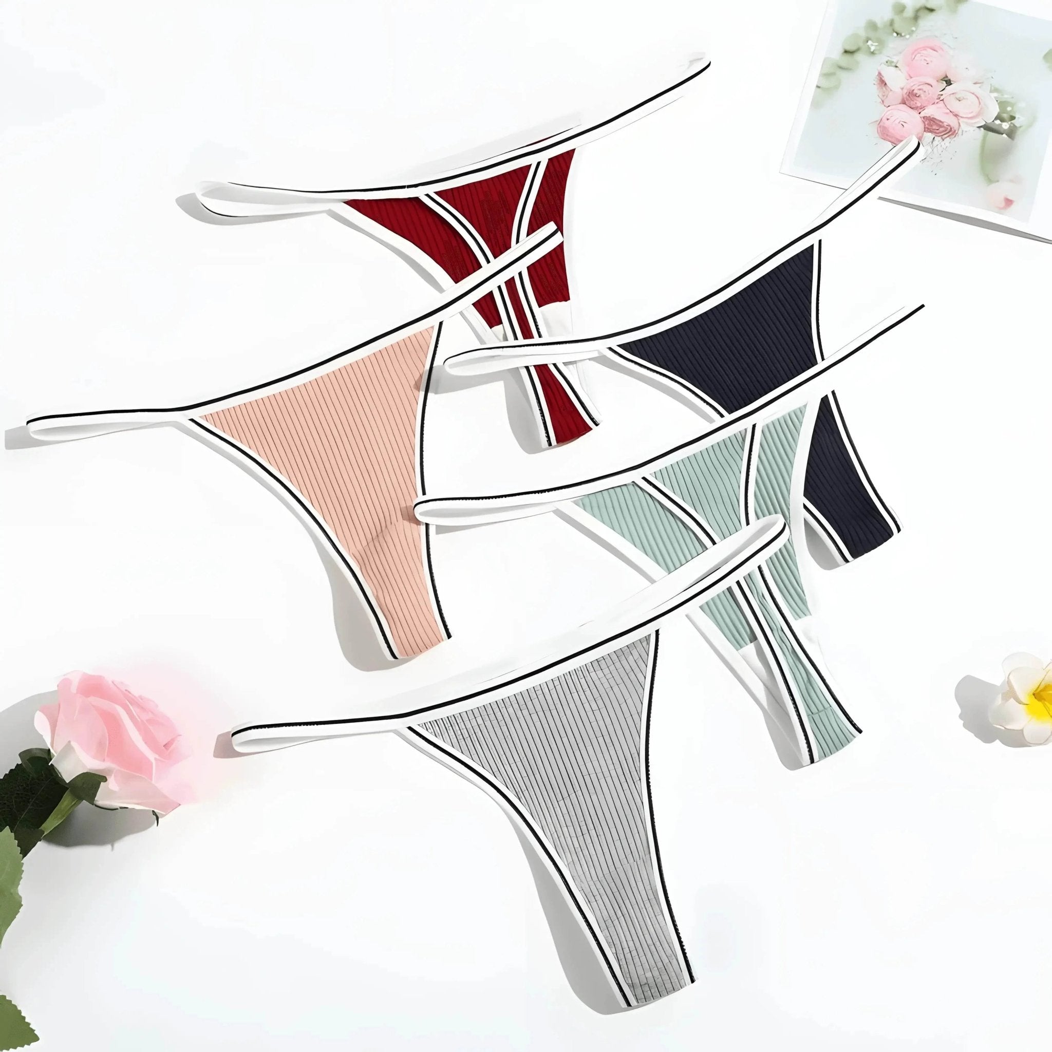Assorted ribbed women's thong underwear in multiple colors on white background, Ivorynn fashion