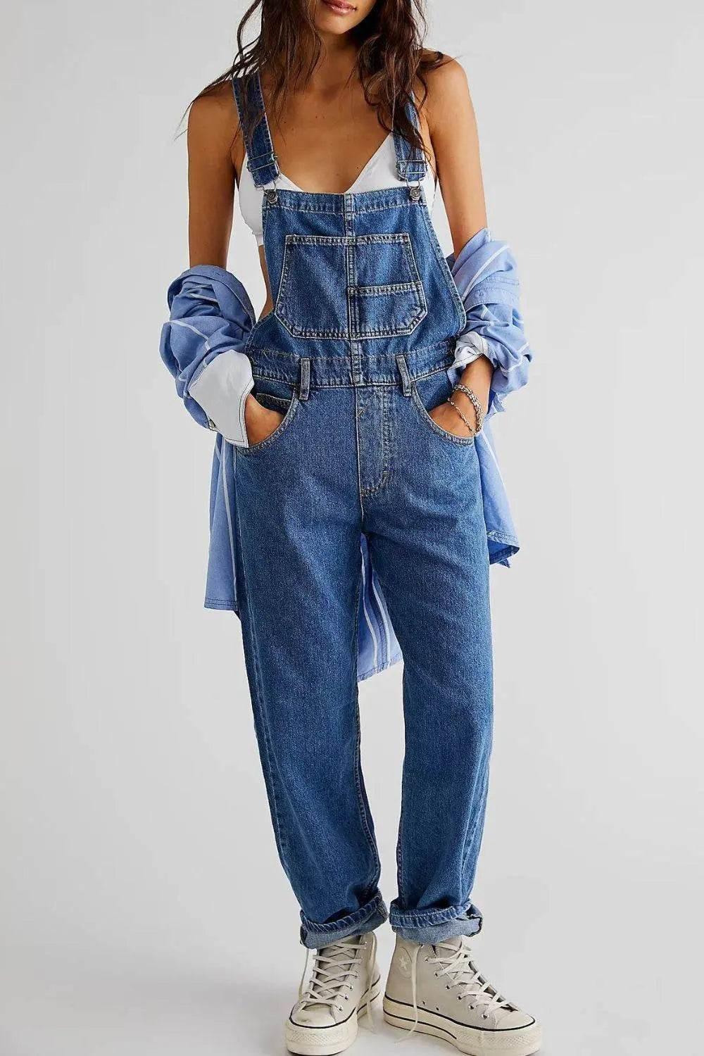 Woman wearing blue denim overalls, white top, and sneakers, stylish casual fashion from Ivorynn