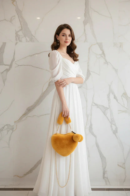 صورة 3 - حمل الحقيبة بجانب الجسم