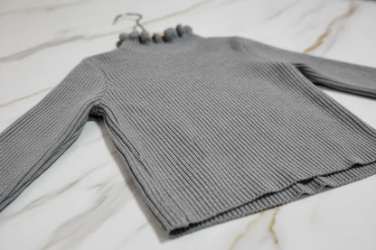 سويتر رمادي - تفاصيل النسيج