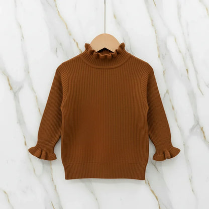 سويتر لون القهوة - معلق على شماعة