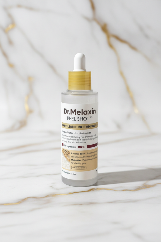 منظر أمامي - سائل أبيض رمادي وقطارة ذهبية