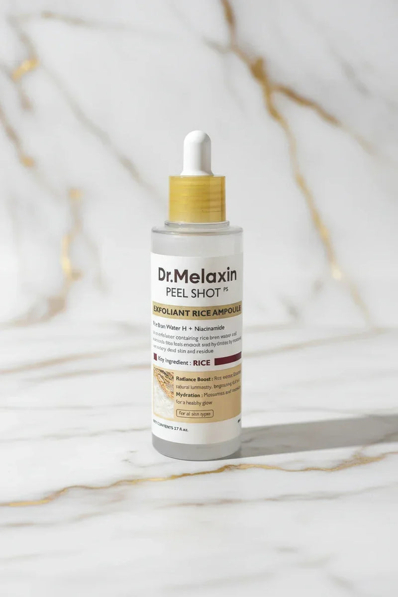 منظر أمامي - سائل أبيض رمادي وقطارة ذهبية