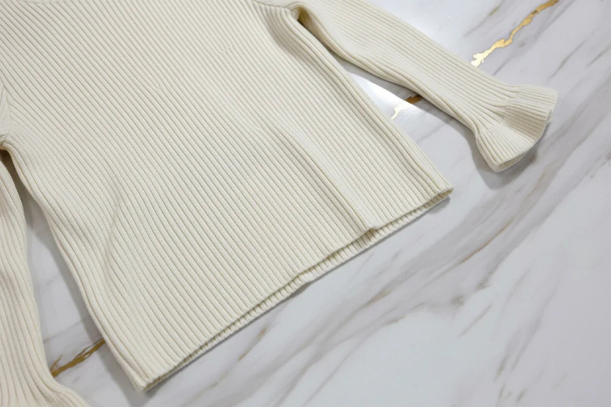 سويتر كريمي - تفاصيل النسيج