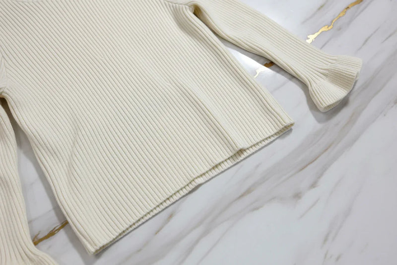 سويتر كريمي - تفاصيل النسيج