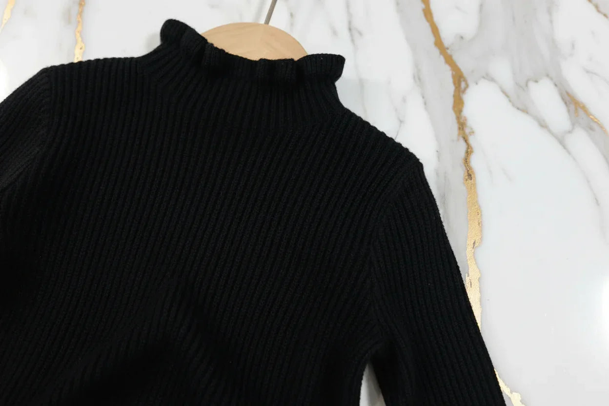 سويتر أسود - تفاصيل النسيج