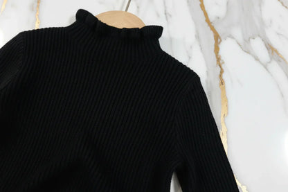 سويتر أسود - تفاصيل النسيج