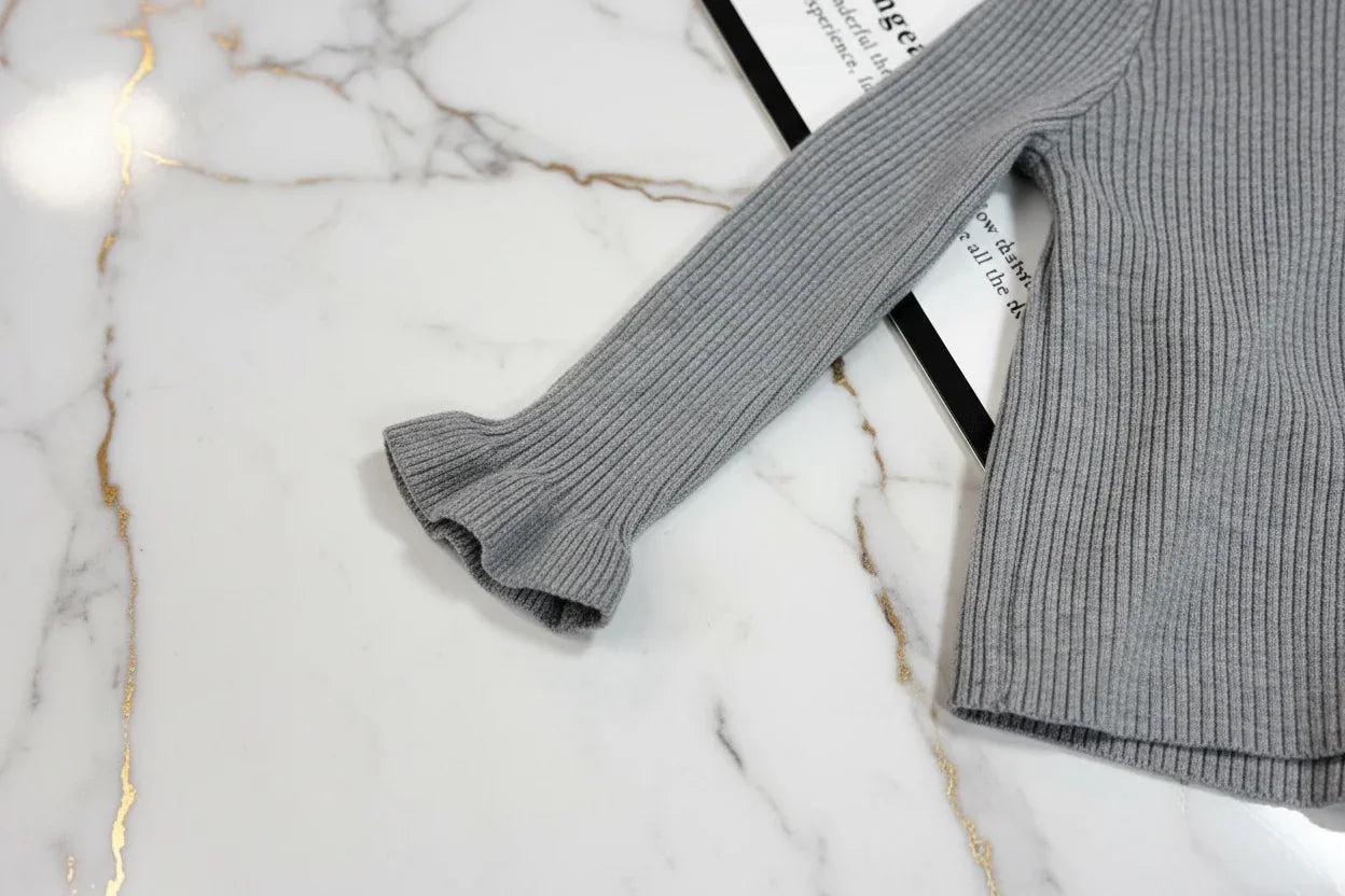سويتر رمادي - تفاصيل الكم