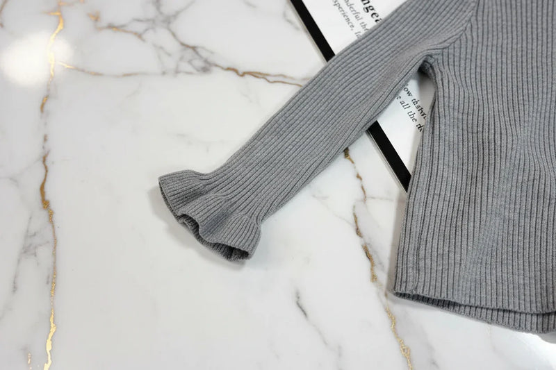 سويتر رمادي - تفاصيل الكم
