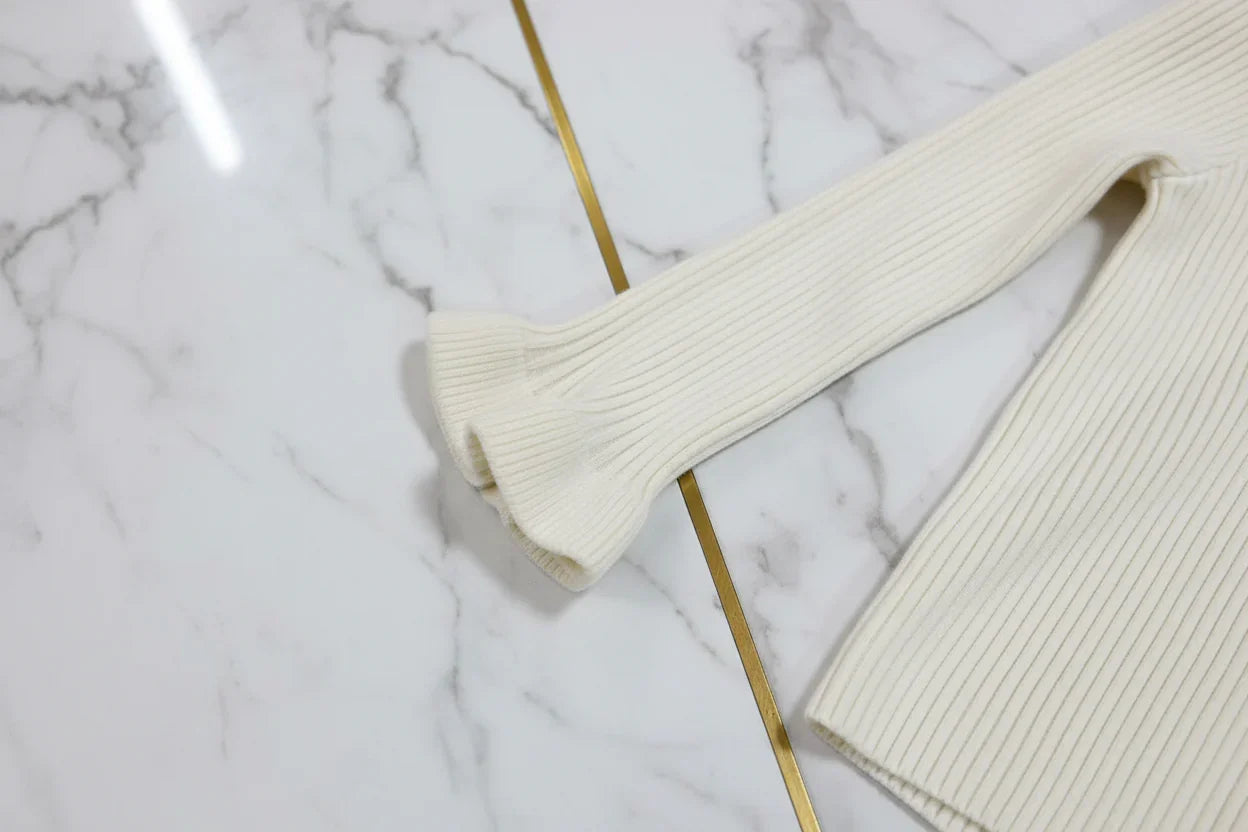 سويتر كريمي - تفاصيل الكم