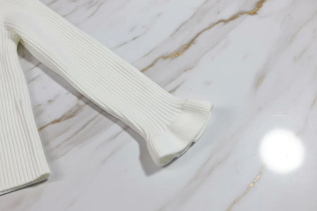 سويتر أبيض - تفاصيل الكم