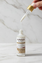 القطارة تنزل السائل الأبيض الرمادي