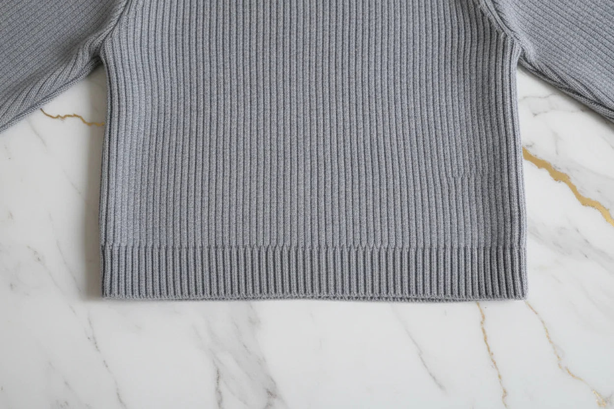 سويتر رمادي مبطن - تفاصيل النسيج