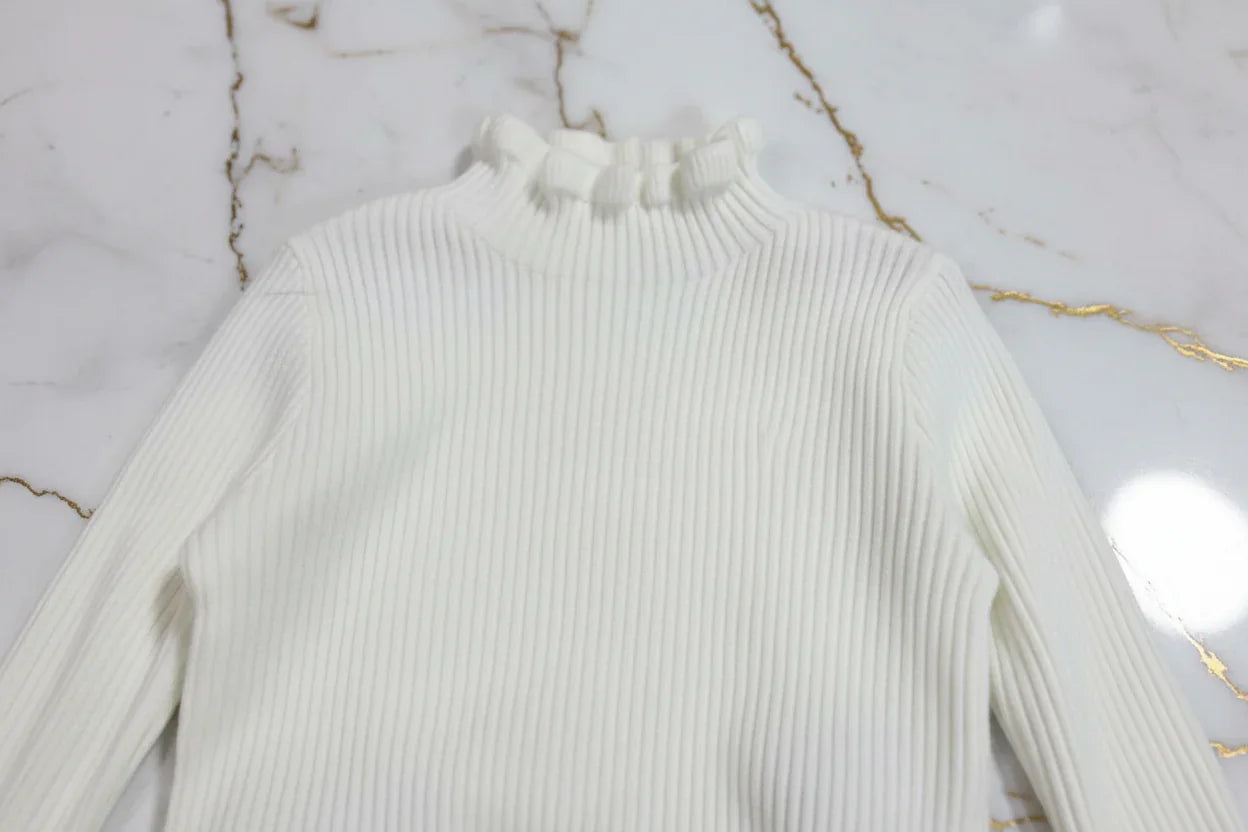 سويتر أبيض - تفاصيل النسيج