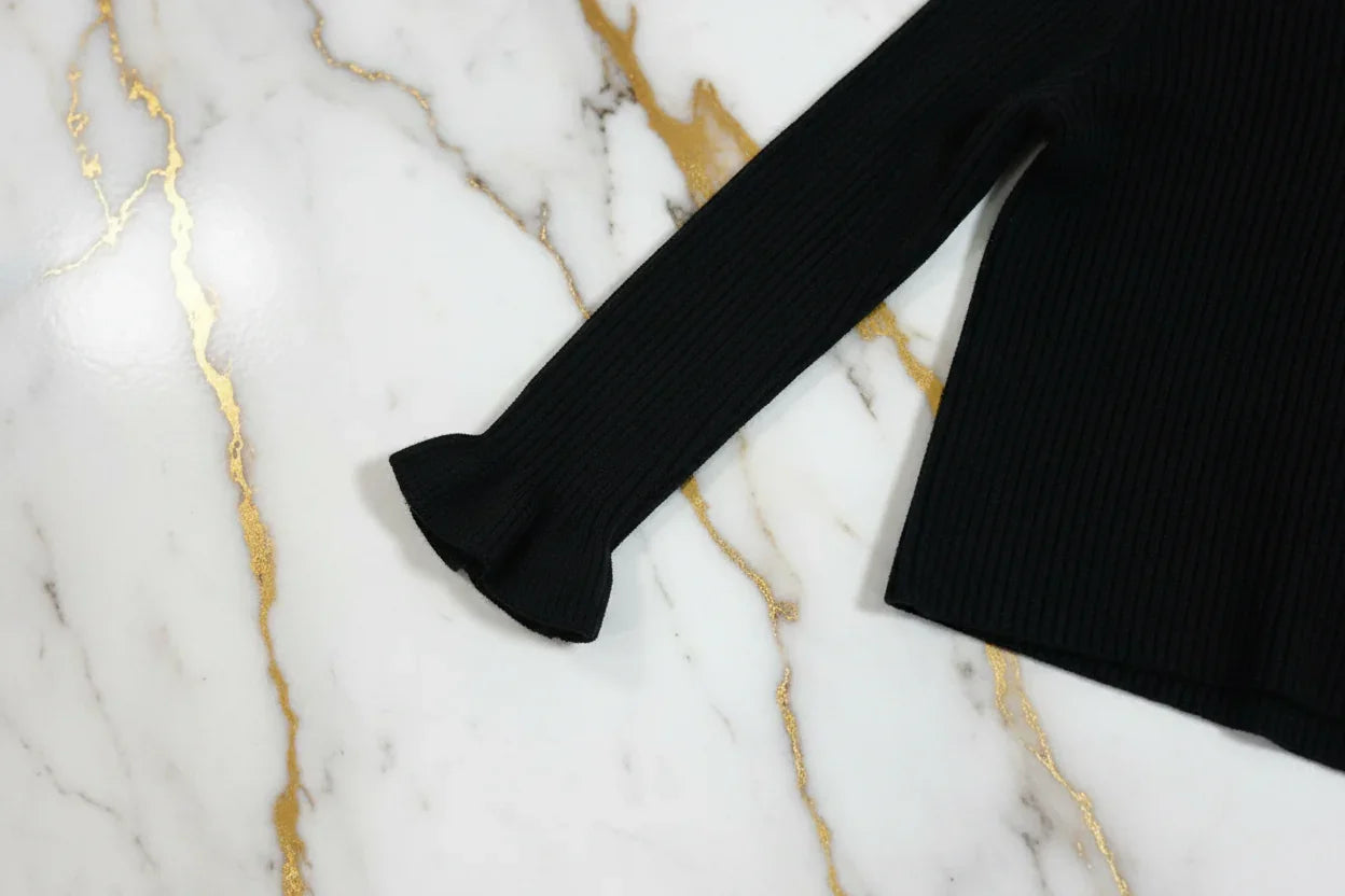 سويتر أسود - تفاصيل الكم