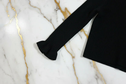 سويتر أسود - تفاصيل الكم