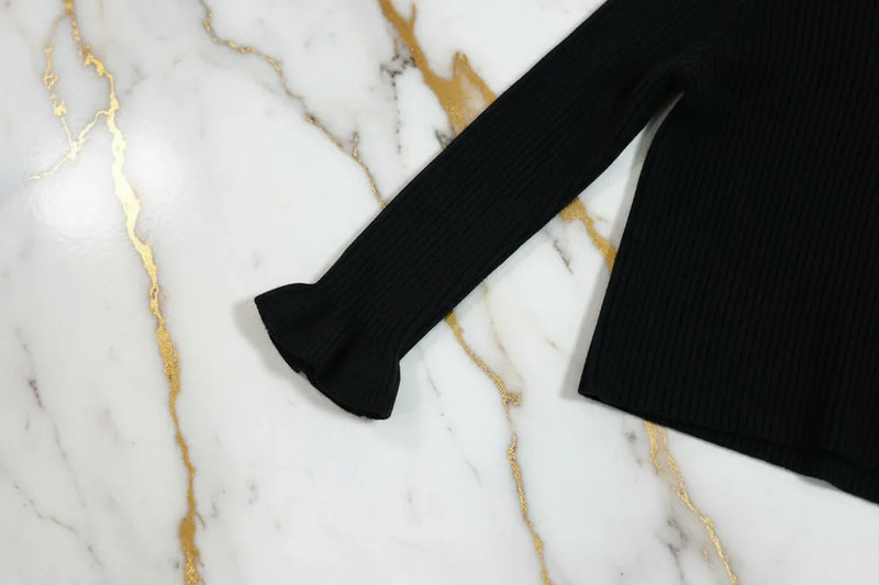 سويتر أسود - تفاصيل الكم