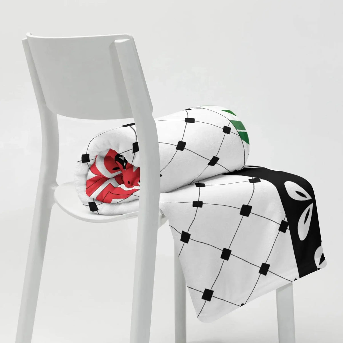 Floral throw blanket with grid pattern and colorful accents draped on a white chair, Ivorynn home decor