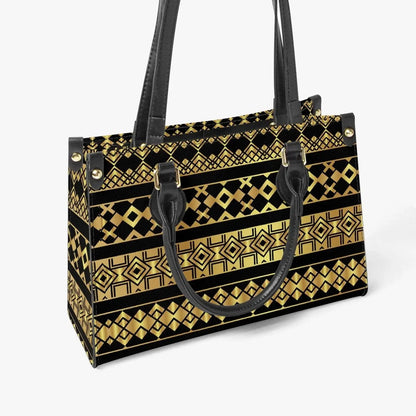 Ivorynn geometric tote bag with black handles and gold pattern, modern fashion accessory