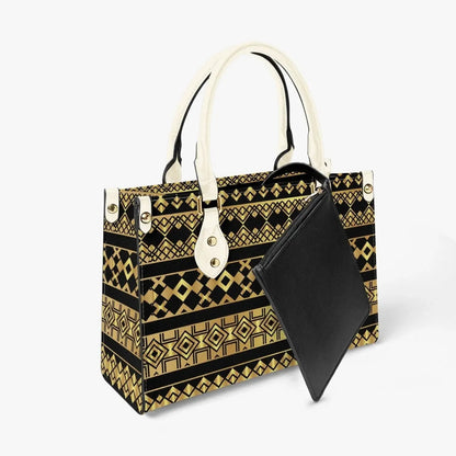 IVORYNN geometric pattern tote bag with ivory handles and black detachable pouch