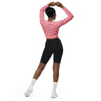 Woman modeling apricot polka dot long-sleeve crop top and black shorts, Ivorynn fashion