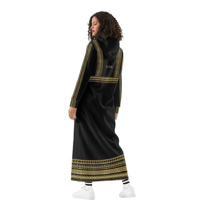 Woman modeling IVORYNN elegant black casual long hoodie dress with gold trim, white sneakers