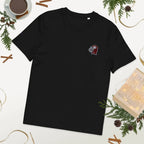 Black organic cotton t-shirt with embroidered red monkey, flat lay with festive decor, Ivorynn
