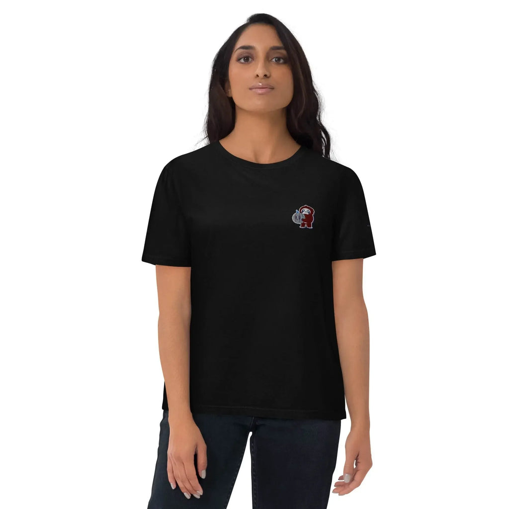 Woman wearing black organic cotton t-shirt with embroidered little monkey, Ivorynn fashion