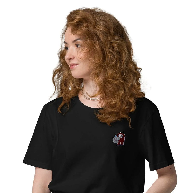 Woman wearing a black IVORYNN t-shirt with an embroidered little monkey design on chest