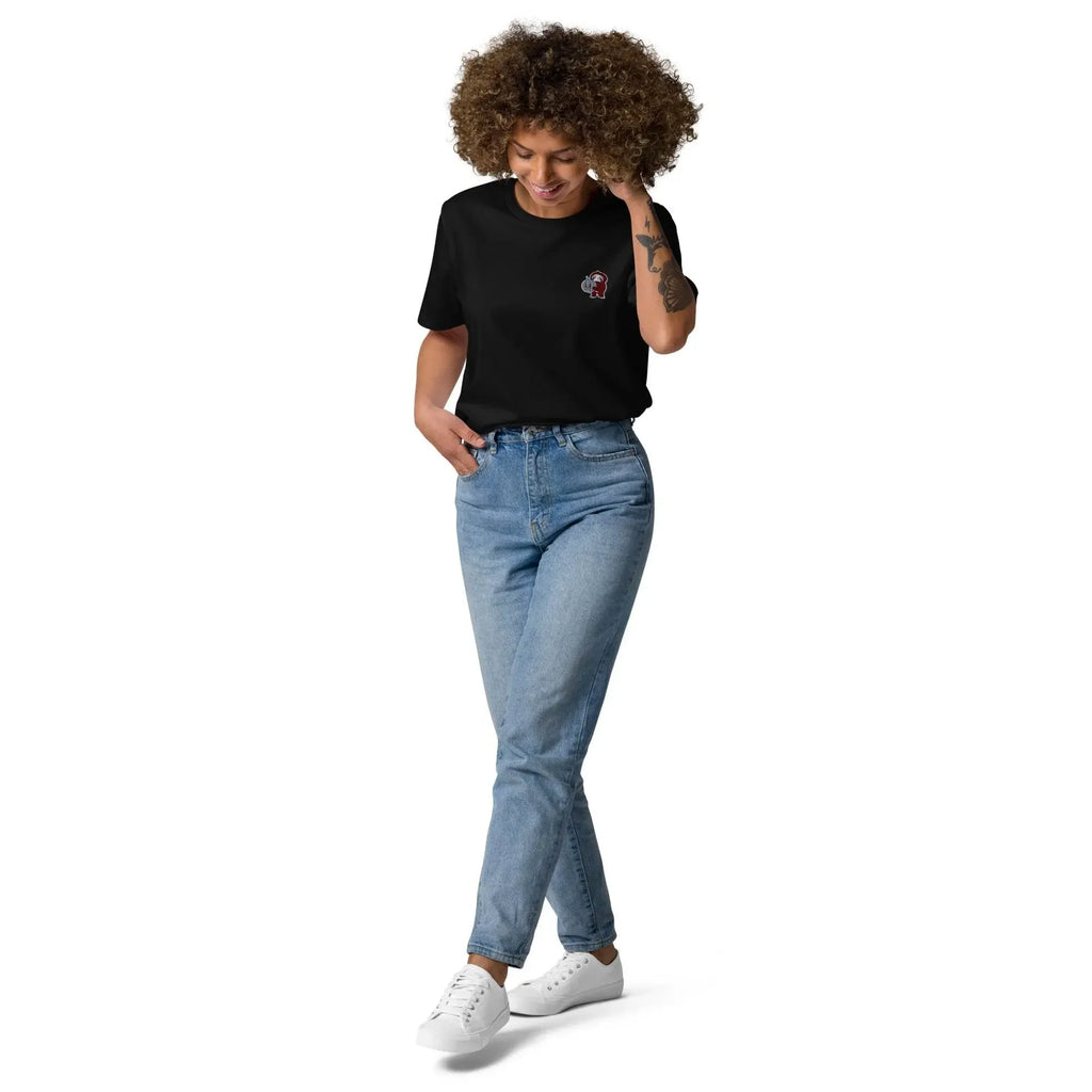 Woman wearing black embroidered monkey organic cotton t-shirt and blue jeans from Ivorynn