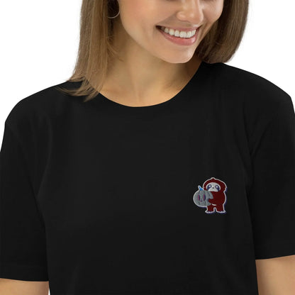 Woman wearing black organic cotton t-shirt with embroidered red monkey patch, Ivorynn fashion