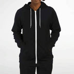 Woman wearing black zip-up hoodie with white drawstrings from IVORYNN fashion collection