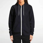 Woman wearing black zip-up hoodie with white drawstrings from IVORYNN