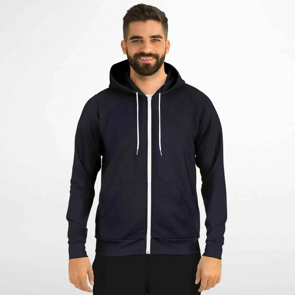 Man wearing a black zip-up hoodie with white drawstrings, modern casual fashion at Ivorynn.