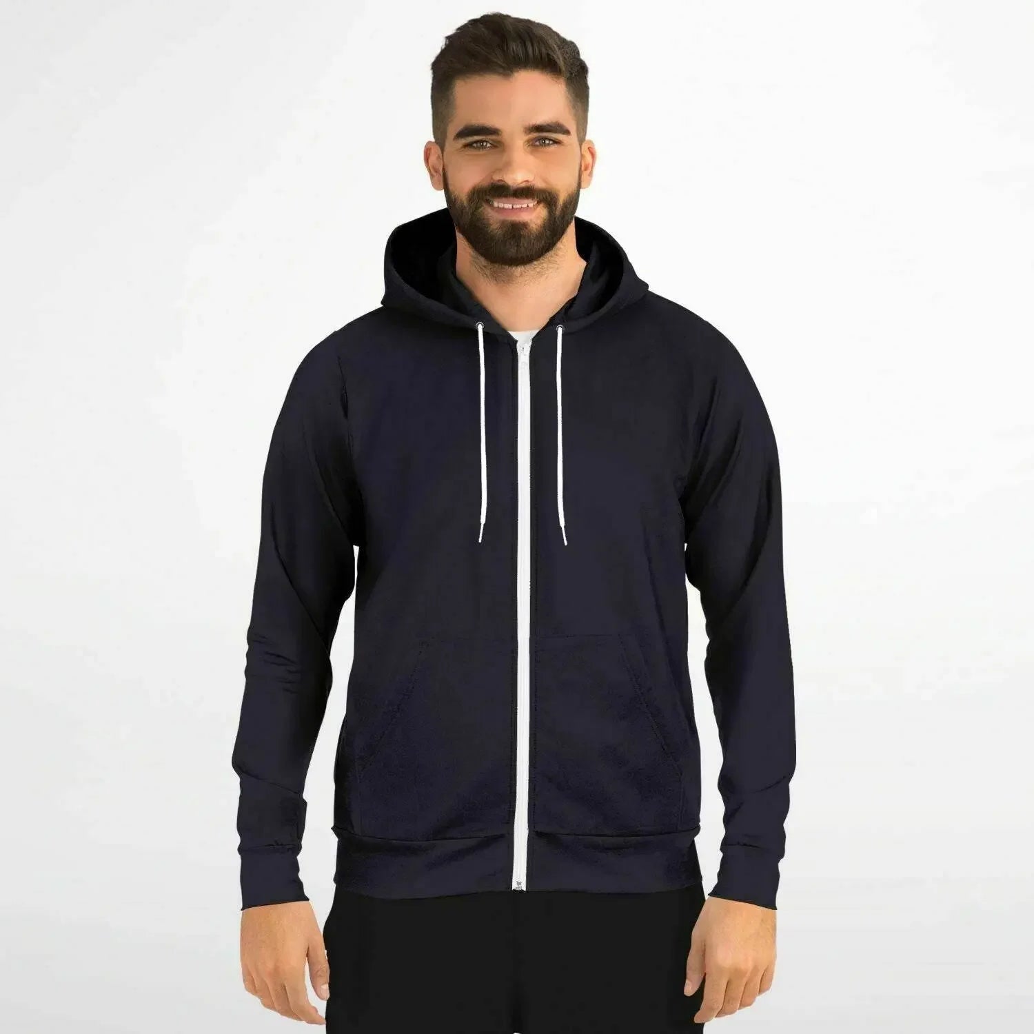 Man wearing a black zip-up hoodie with white drawstrings, modern casual fashion at Ivorynn.