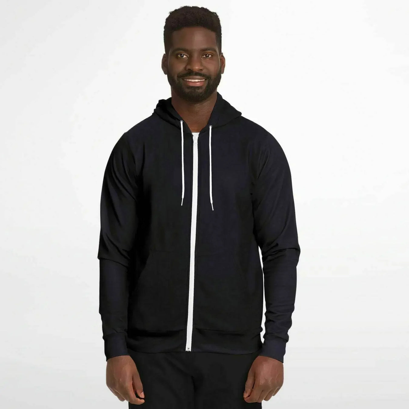 Man modeling Faith Athletic black zip-up hoodie with white drawstrings from Ivorynn