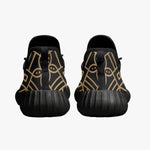 Black knit mesh men's sneakers with gold geometric pattern, luxury shoes at Ivorynn