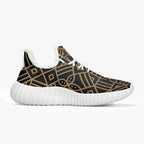 Men's black knit mesh sneaker with gold geometric pattern and white sole from Ivorynn