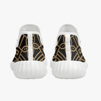 Back view of men's knit mesh sneakers with golden geometric pattern from IVORYNN