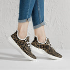 Golden geometric pattern mesh sneakers for men from Ivorynn, white sole, worn with rolled jeans