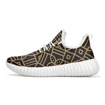 Men's knit mesh sneaker with black and gold geometric pattern, white sole, from Ivorynn