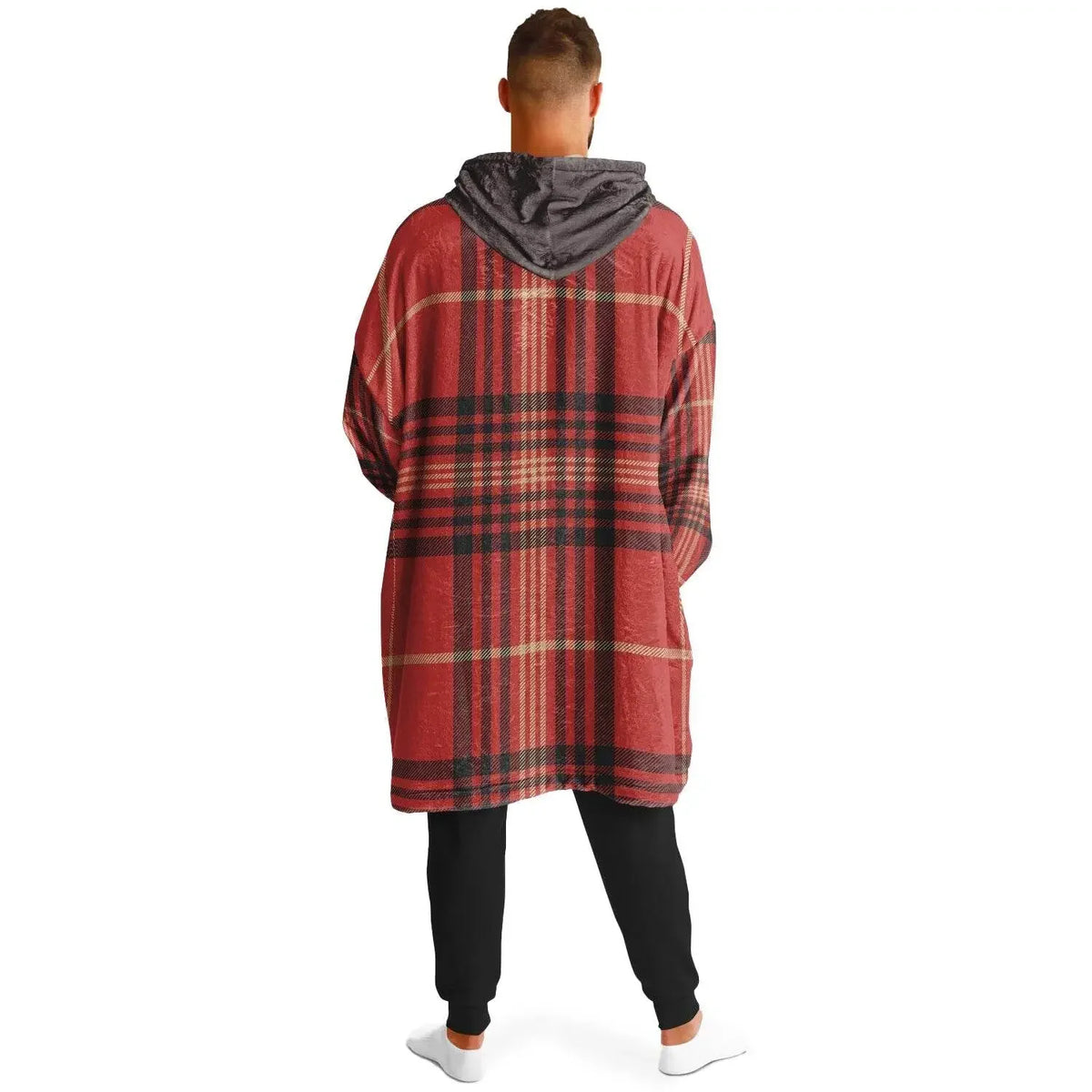 Back view of man in oversized red plaid cozy hoodie with gray hood, black pants, on white background, Ivorynn fashion.
