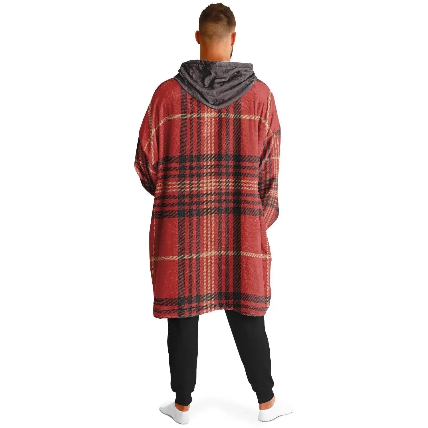 Back view of man in oversized red plaid cozy hoodie with gray hood, black pants, on white background, Ivorynn fashion.