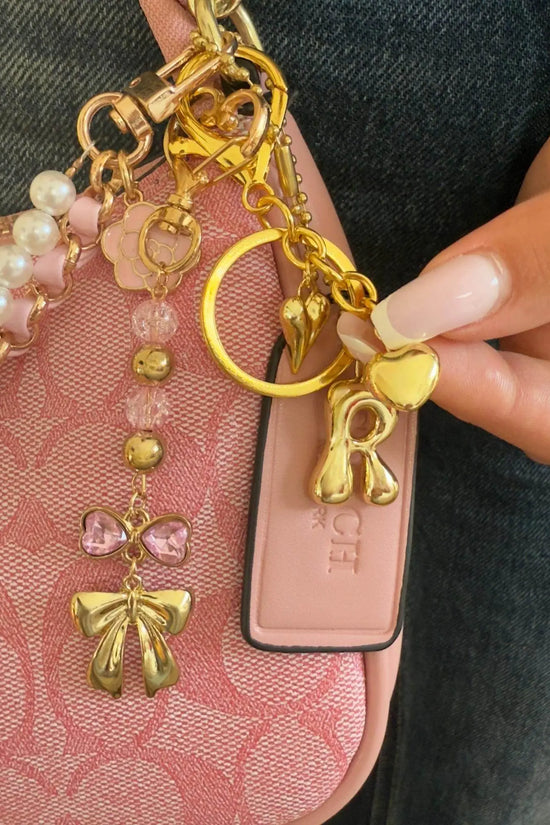 Vintage Luxury Pink Handbag with Pearls and Charms - IVORYNN