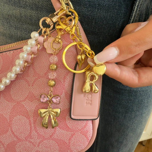 Vintage Luxury Pink Handbag with Pearls and Charms
