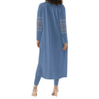 Woman modeling blue long sleeve cardigan with patterned sleeves and matching leggings from Ivorynn