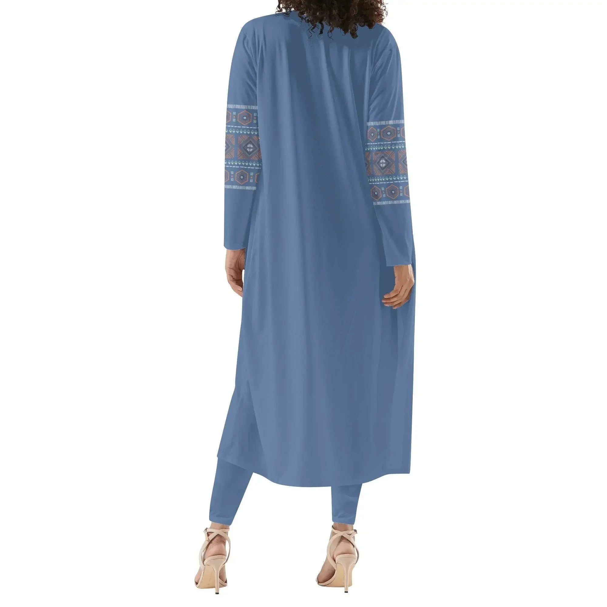 Woman modeling blue long sleeve cardigan with patterned sleeves and matching leggings from Ivorynn