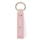 Pink faux leather keychain with gold ring, branded MISHA STYLE, modern and stylish accessory.