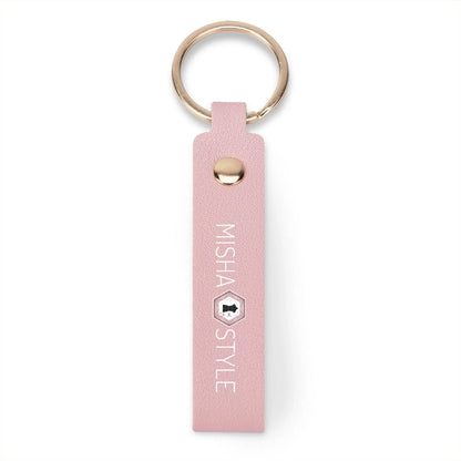 Pink faux leather keychain with gold ring, branded MISHA STYLE, modern and stylish accessory.